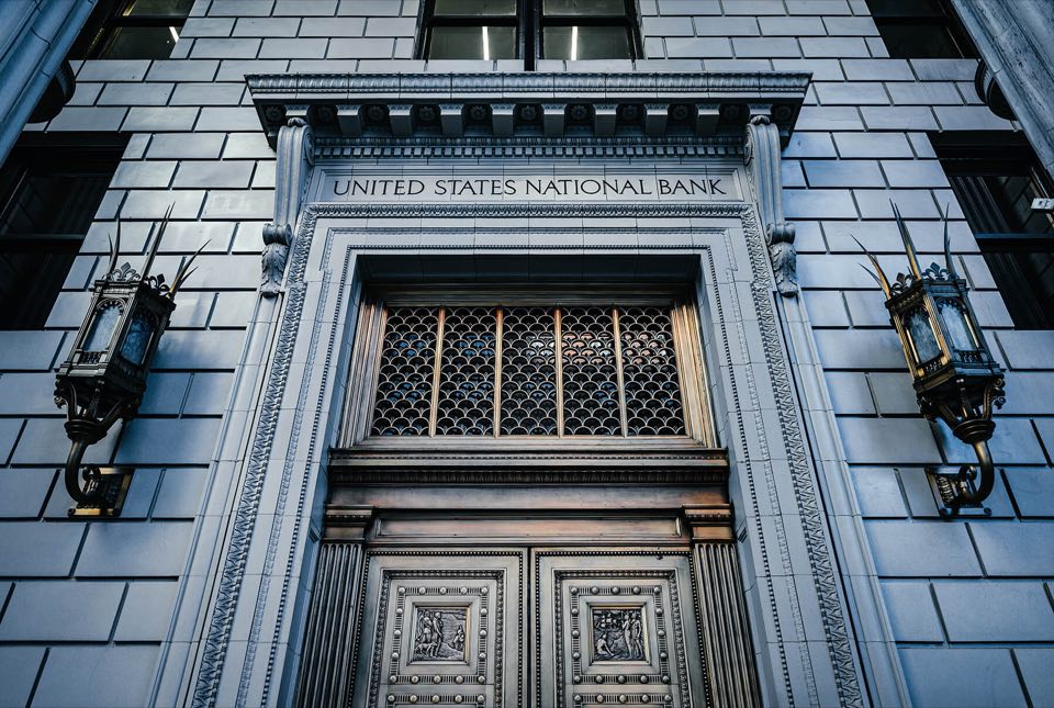 The stone facade of a United States national bank